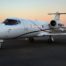 Learjet aircraft with sunset in the background